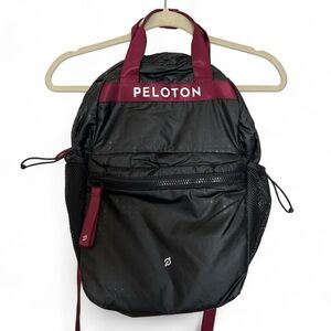 Peloton black backpack with maroon accents